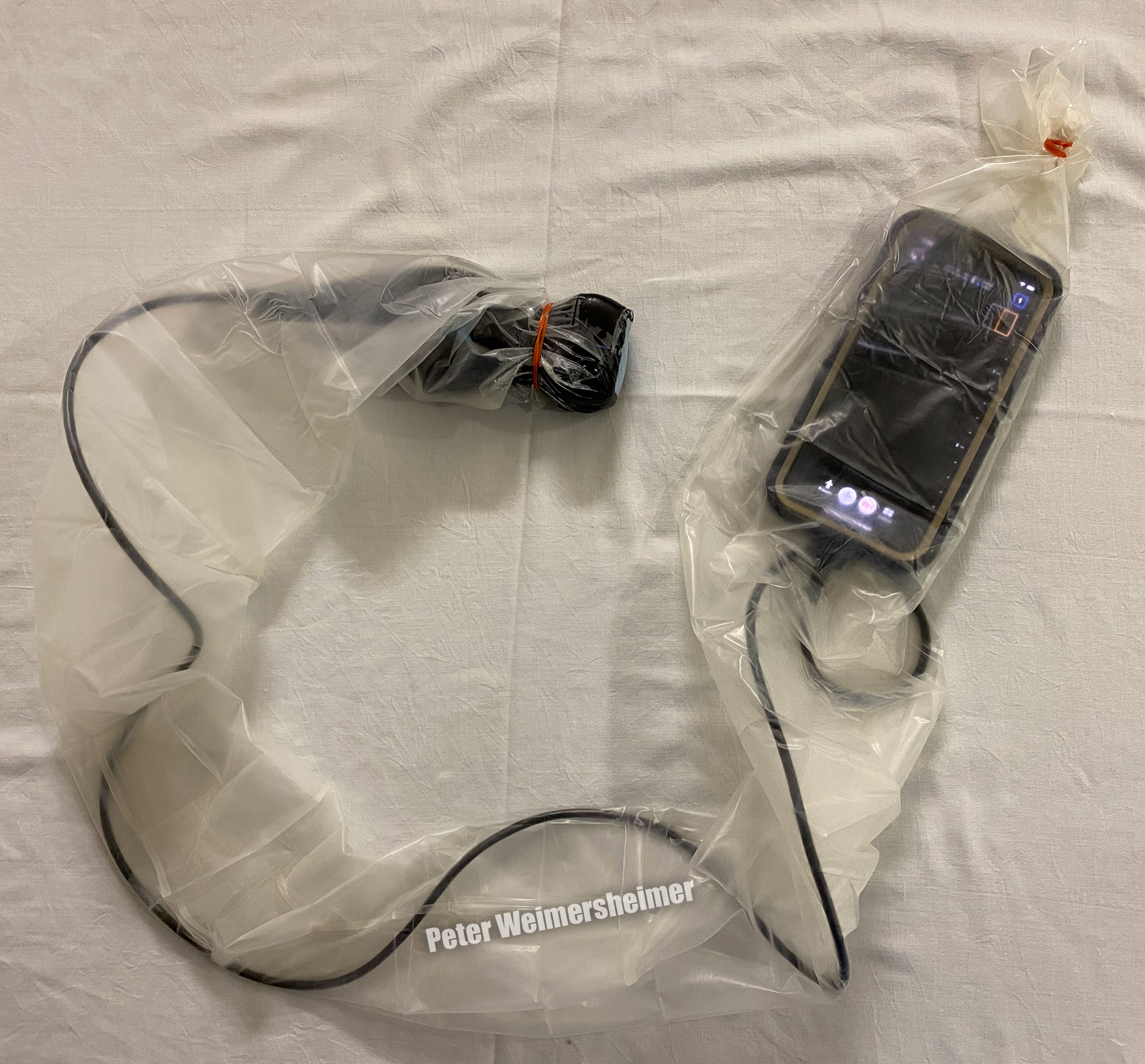 Butterfly IQ with probe sheath cover